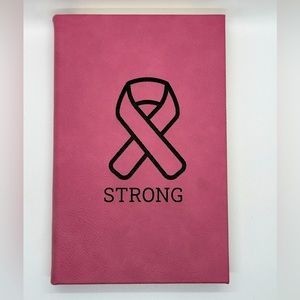 Cancer strong leather notebook 8.25 inches by 5.25 inches.